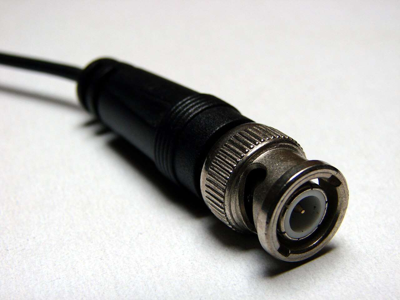 A BNC male connector on a cable, showing the bayonet slots in the coupling ring