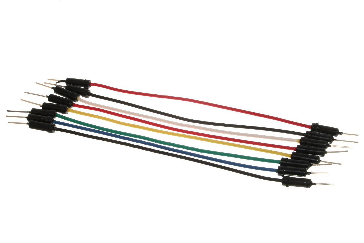 A handful of 0.1-inch jumper wires: colored wires ending in individually crimped pins inside single-position black housings